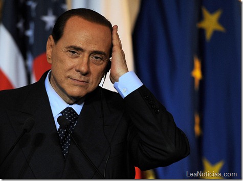 Italian Prime Minister Silvio Berlusconi gestures during a joint press conference with US President George W. Bush (not in the picture) at Villa Madama in Rome on June 12, 2008. Bush, on a legacy-shaping farewell trip to Europe, predicted that his successor in January will inherit "the broadest and most vibrant" transatlantic ties ever. Amid disputes over climate change, fighting in Afghanistan, and over aspects of the war on terrorism, plus differences on dealing with Iran's suspect nuclear drive, Bush said victory over Islamist extremism required US-European unity. AFP PHOTO / FILIPPO MONTEFORTE (Photo credit should read FILIPPO MONTEFORTE/AFP/Getty Images)