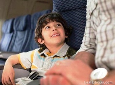 Boy and man on an airplane