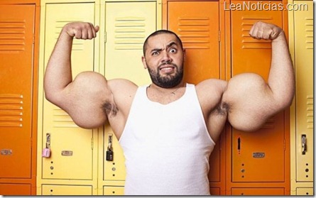 libro de records Guinness para el año 2013 como el hombre con los biceps mas grandes del mundo 1