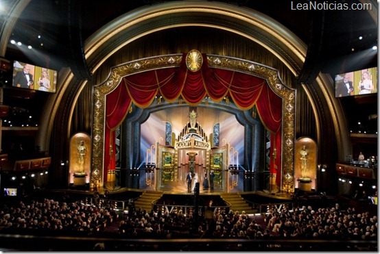Dante Ferretti for production design and Francesca Lo Schiavo for set decoration accept the Oscar® for Achievement in Art Direction for work done on "Hugo," as presented by Tom Hanks, during the live ABC Television Network broadcast of the 84th Annual Academy Awards® from the Hollywood and Highland Center, in Hollywood, CA, Sunday, February 26, 2012.