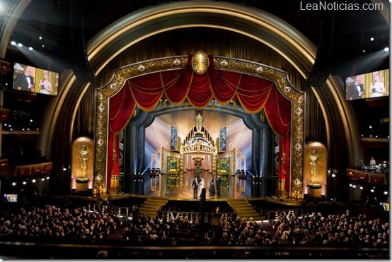Dante Ferretti for production design and Francesca Lo Schiavo for set decoration accept the Oscar® for Achievement in Art Direction for work done on "Hugo," as presented by Tom Hanks, during the live ABC Television Network broadcast of the 84th Annual Academy Awards® from the Hollywood and Highland Center, in Hollywood, CA, Sunday, February 26, 2012.