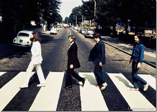 BNPS.co.uk (01202) 558833
Picture: Bloomsbury/BNPS
An incredibly rare photo taken during a 10 minute shoot for the Beatles famous Abbey Road album cover in 1969 is being tipped to sell for 10,000 pounds when it goes under the hammer at Bloomsbury London.
The image shows the Fab Four walking the opposite way over the Abbey Road zebra-crossing, compared to the final picture. Paul McCartney is also shown wearing a pair of leather flip-flops, whereas in the photo used he was bare foot.