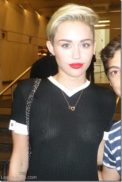 Miley Cyrus goes bra-less in see-through shirt in NYC