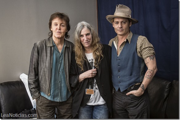 Undated handout photo issued by MPL Communications of (left to right) Paul McCartney, Patti Smith and Johnny Depp on the set of McCartney's Early Days music video shoot, in Los Angeles. PRESS ASSOCIATION Photo. Issue date: Tuesday July 8, 2014. See PA story SHOWBIZ McCartney. Photo credit should read: MJ KIM/MPL Communications/PA Wire

NOTE TO EDITORS: This handout photo may only be used in for editorial reporting purposes for the contemporaneous illustration of events, things or the people in the image or facts mentioned in the caption. Reuse of the picture may require further permission from the copyright holder.