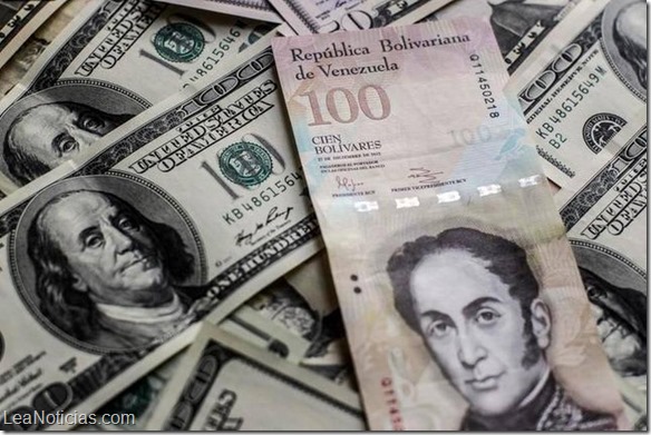 Empresas cambian al dólar en la Venezuela socialista