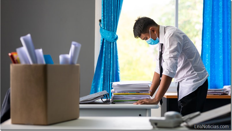 Sad fired asian businessman sitting outside room after being dismissed concept of business failure and unemployment problem due to the global impact of COVID-19.