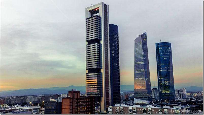 Four towers of the financial zone at sunset.